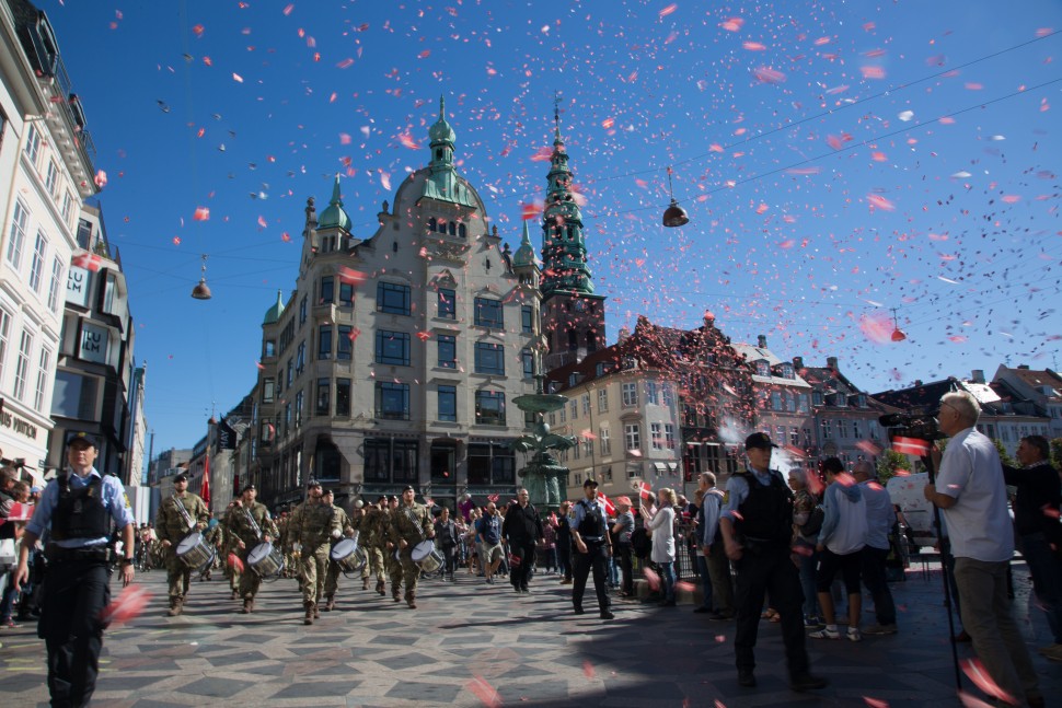 Soldiers from Operation Inherently Resolve hold 3 and Resolute Support Mission team 4 march from Stroget into City Hall on flag day for Denmark issued September 5, 2016.